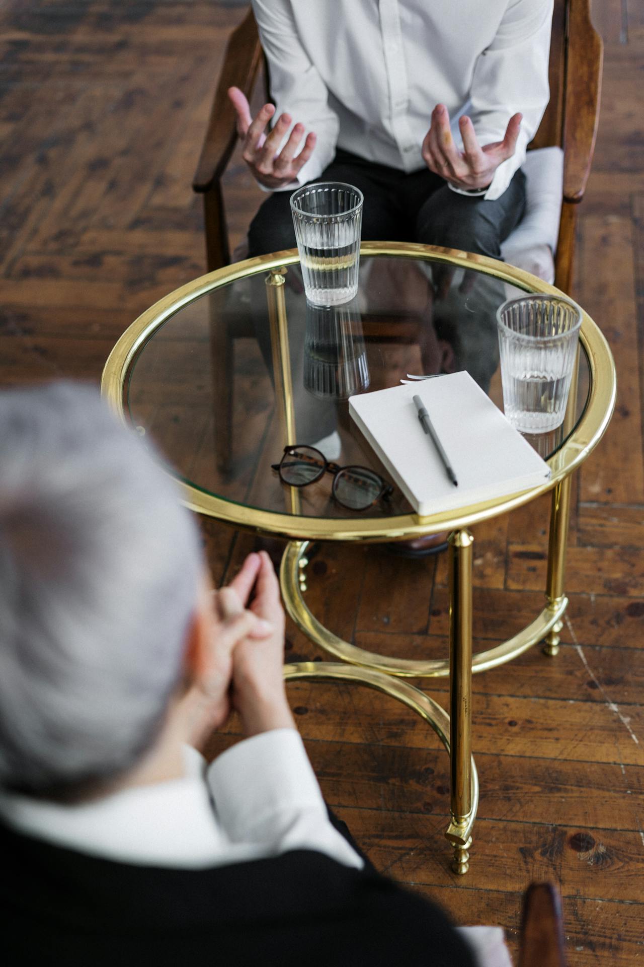 a woman and a man discussing business